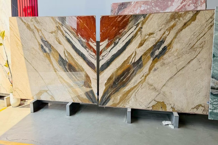 Breccia Fantastique Marble bookmatched slabs with cream, rust-orange and grey veining